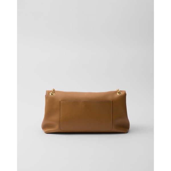 Medium leather shoulder bag caramel color